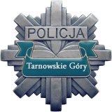 policyjna odznaka z logo POLICJA Tarnowskie Góry