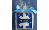 własnoręcznie robiona policyjna gwiazda, którą dzielnicowi otrzymali w podziękowaniu za wizytę