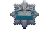 policyjna odznaka z logo POLICJA