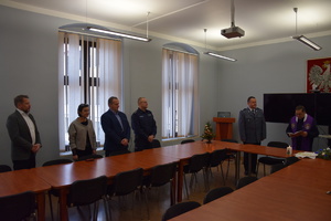 na zdjęciu osoby w sali narad w trakcie spotkania opłatkowego