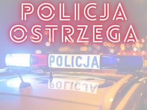 na zdjęciu policyjne neon a nad nim czerwony napis policja ostrzega