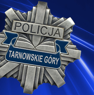 Na zdjęciu policyjna gwiazda z napisem Tarnowskie Góry